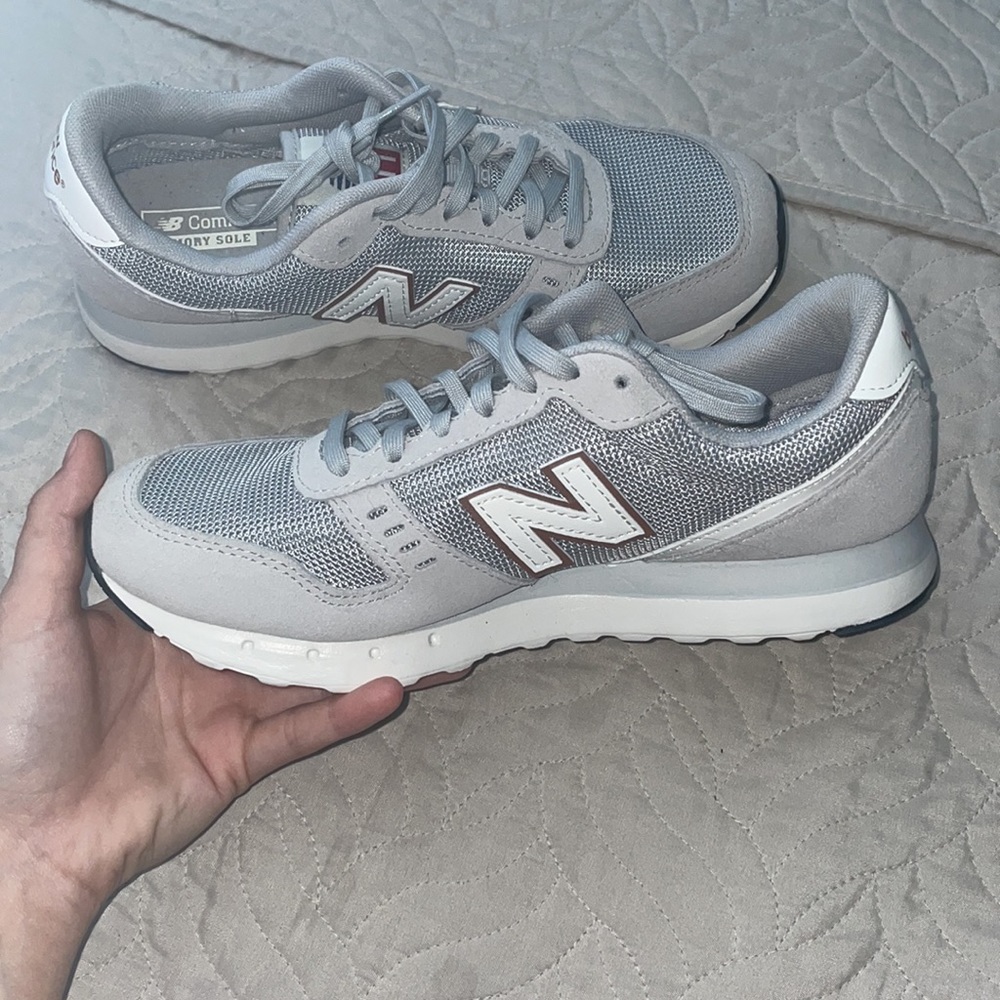 New Balance 311